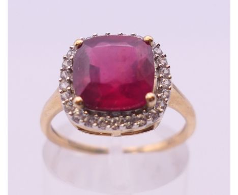 A 10 k gold synthetic ruby ring. Ring size N.