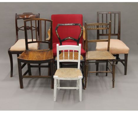 A quantity of various 19th century and later chairs and a fire screen. The latter 64 cm wide.