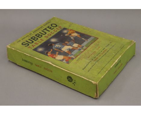 A boxed vintage Subbuteo set. The box 36 cm wide.