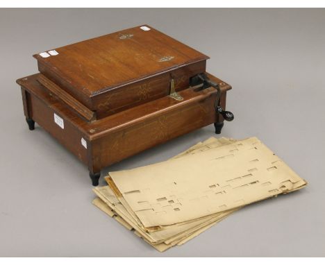 A vintage organette. 31 cm wide.