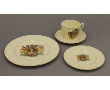 A quantity of decorative ceramics and glassware including a Clarice Cliff Queen Elizabeth II Coronation teacup, saucer and tw