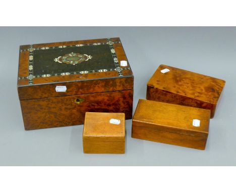 An inlaid burr wood box containing various items including a thermometer, a calendar, Dad's Army postcards and other boxes. T