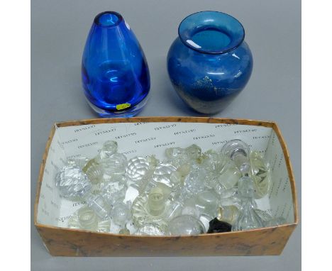 A Medina glass vase, another vase and a quantity of decanter stoppers. The former 19.5 cm high.