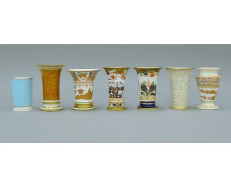 Seven 19th century spill vases including Spode and Imari. The largest 12.5 cm high.