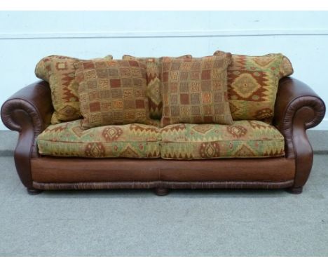 Three seat sofa (W230cm) and pair matching armchairs in brown leather and fabric with feather scatter cushions