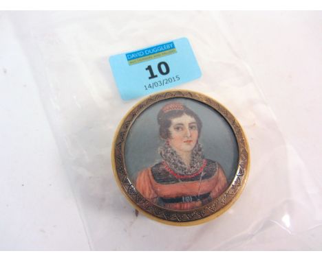 Late 18th century ivory and tortoiseshell patch box set with circular portrait miniature of a young lady brown hair with pink