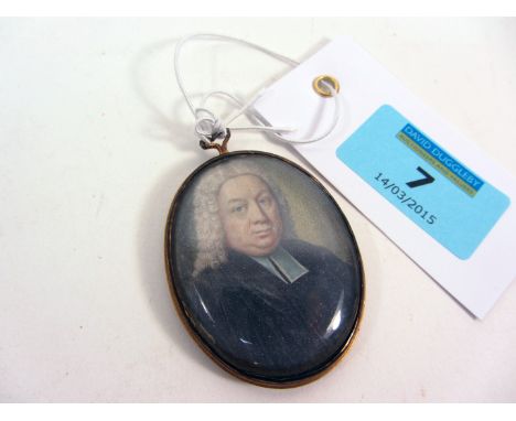 English School (late 18th century): Oval portrait miniature of a gentleman watercolour on ivory in grey coat, grey curled wig
