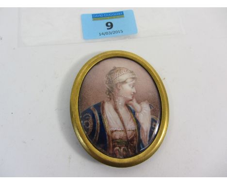 English School (late 18th century): Oval portrait miniature of a lady, watercolour on ivory, plaited brown hair, blue and gol