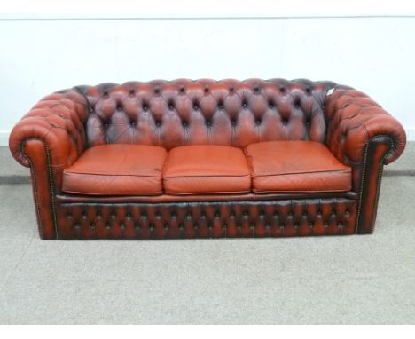 Three seat Chesterfield sofa in red buttoned leather, W190cm