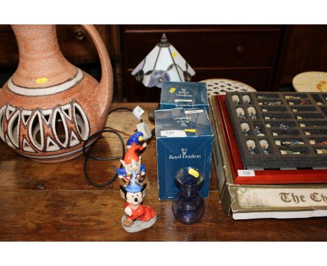 A Tiffany style table lamp; an Art Glass vase; Royal Doulton figures including 'Noddy' and 'The Sorcerer's Apprentice'