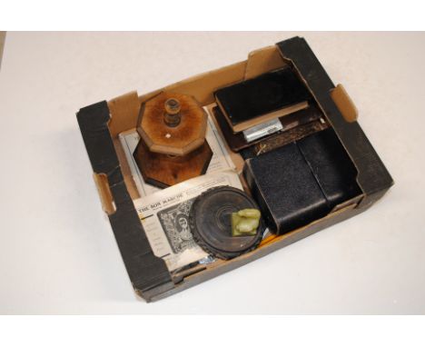 A box containing a horn handled penknife; a cigarette lighter; a hardwood stand; various coinage; an AA badge; a jade coloure
