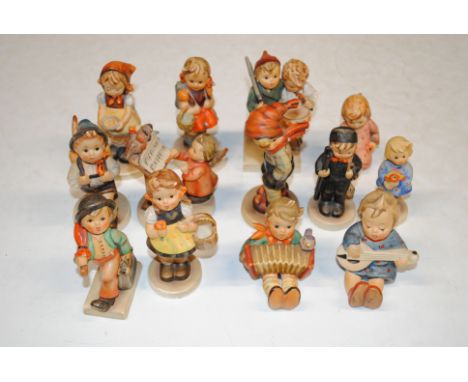 A collection of Goebel figures