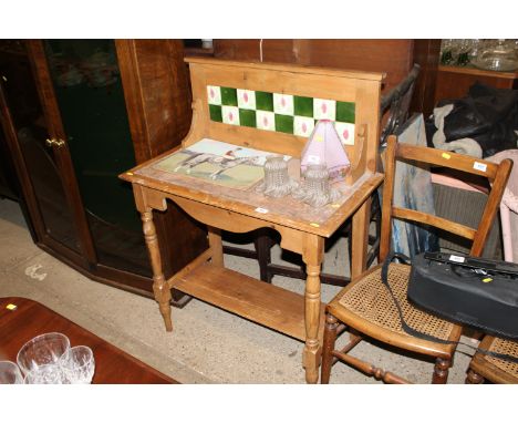 A pine and tile back wash stand