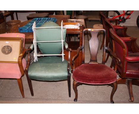 A Queen Anne style elbow chair impressed to leg T7468, a mahogany framed and upholstered elbow chair and a white painted wall