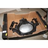 A box containing a pair of door handles and a cast