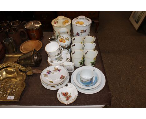 A collection of Royal Worcester Evesham, egg coddlers etc