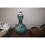 A blue continental pottery table lamp