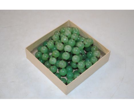 A jade coloured bead necklace