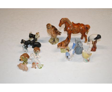 Two boxes containing a whistle in the form of a bird; Goebel and Beswick ornaments; a box containing Wade Whimsies and other 