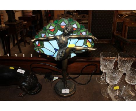 A Tiffany style figural decorated lamp