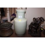 A Chinese celadon vase, base drilled