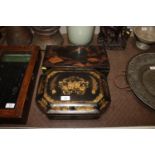 Two oriental lacquered and gilt decorated boxes