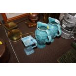 A pair of Wade jugs numbered 144 and one other jug