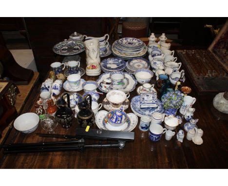 A collection of various decorative blue and white patterned teaware, dinnerware, ornaments etc. and a sheet music stand