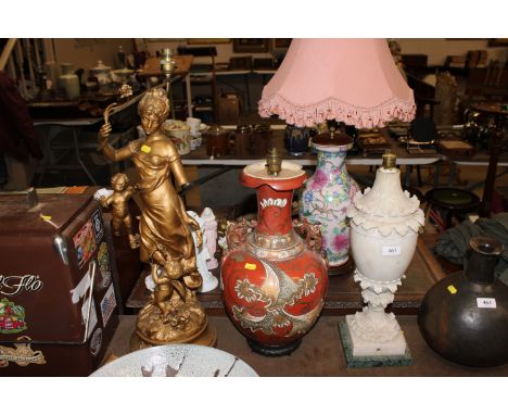 A gilt figural decorated table lamp AF; an Oriental table lamp and an alabaster table lamp AF