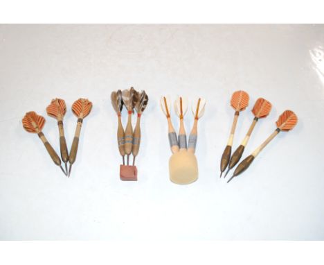 Four sets of vintage darts