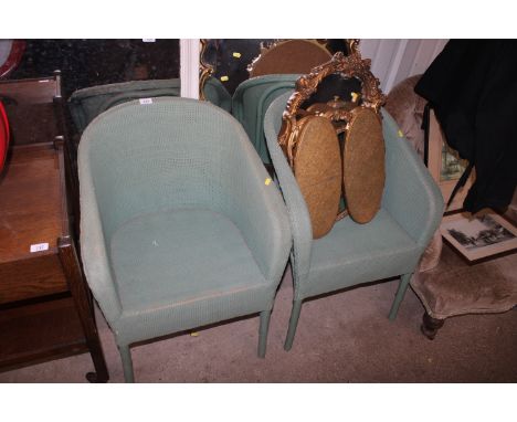 A pair of Lloyd Loom armchairs