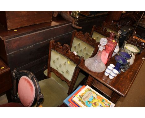 A set of four late Victorian button back upholstered chairs