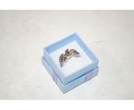 A vintage sterling silver amethyst and marcasite ring, size Q/R