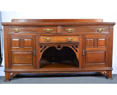 Late Victorian walnut sideboard, rectangular top with shallow back moulded edge, three drawers and cupboards surrounding an a