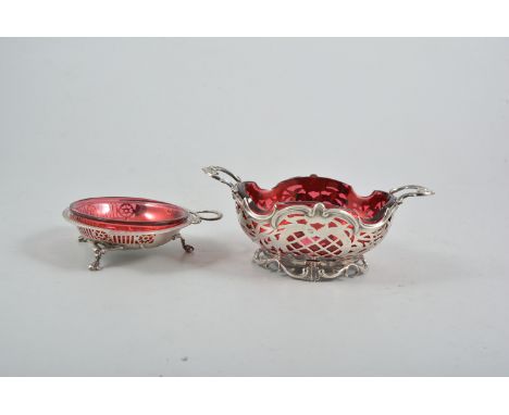 Edwardian silver pierced two handled sugar basin, London 1906, with cranberry liner and another silver bell shaped bon bon di