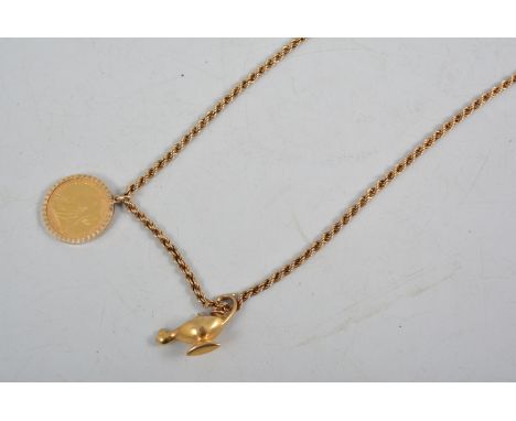 A Full Soveregn pendant and chain, Full Sovereign Victoria 1900 veiled head set in a 9 carat yellow gold pendant mount with b