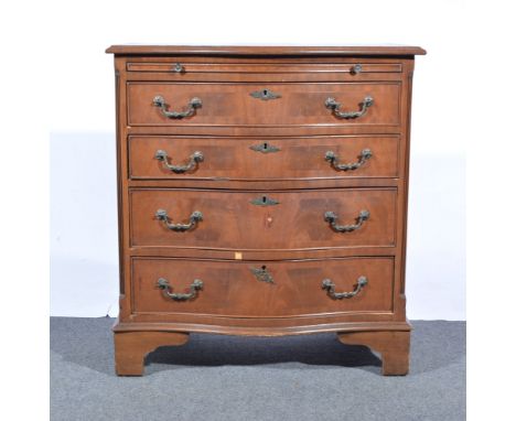 Reproduction mahogany small chest of drawers, bow-front, the top with a moulded edge, broad cross-banding, fitted with four l