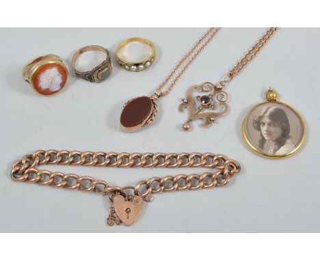 Vintage gold jewellery, a 9 carat rose gold curb link bracelet with padlock, approximate weight 10.5gms, a cameo ring 17mm di