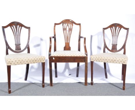 Set of four Hepplewhite style mahogany dining chairs, shield shape backs, machine made tapestry upholstery, square moulded le