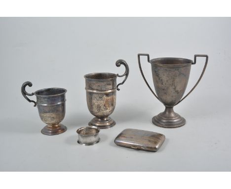 Silver mug, Birmingham 1920, 10cm, cigarette case and napkin ring, and two plated cups (5).