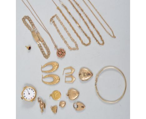 A collection of gold jewellery to include chains, bracelets, bangle, earrings, charms, pendant and chain, 18 carat gold watch