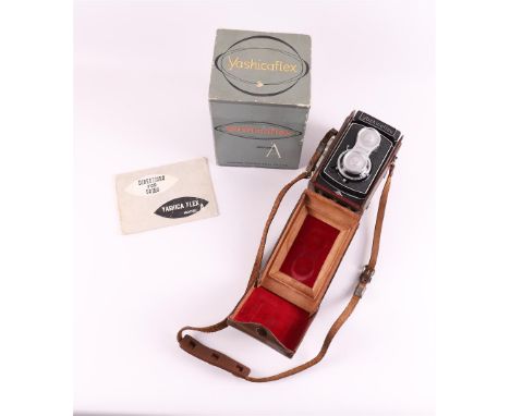 A Yashicaflex model A, photo camera, Yashima Kogaku Seiki Co.LTD, 1955. In original leather case, box and instructions for us