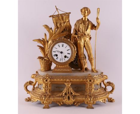 A bronzed white metal mantel clock, France, late 19th century. Crowning of a young man with a banner, white enamel dial with 