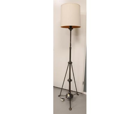 A bronzed brass Art Deco standing table lamp with cylindrical fabric shade, ca. 1920, h 184 cm.