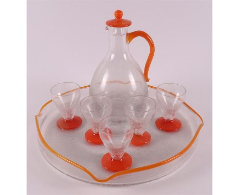 A clear and orange glass Art Deco liqueur decanter with matching glasses, France, Daum Nancy, ca. 1930. Signed on the decante