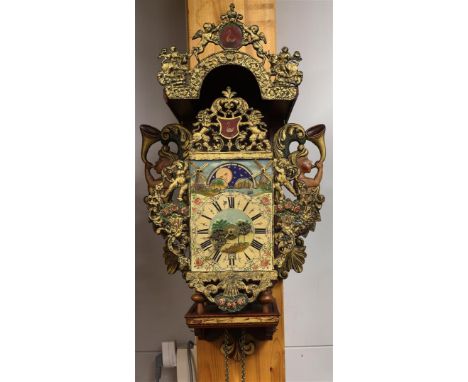 A chair clock with moon indication and mill mechanism, Friesland, 20th century. Polychrome decorated wooden chair with cut-ou