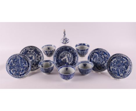 A lot of various blue/white porcelain cups and saucers, China, including Kangxi 18th century. Kangxi style 19th century. O.a.