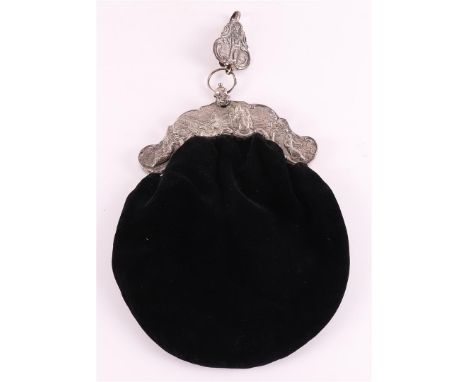 A second grade 835/1000 silver contoured bag bracket on a black fabric bag and matching parrot hook, year letter 1899. Relief