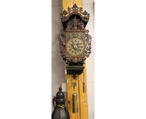 A Frisian chair clock, Friesland, early 19th century. Hood and attic lead with putti and symbolism of charity, among other th