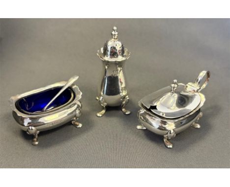 ANTIQUE STERLING SILVER CRUETS to include a blue glass line salt dish, lidded mustard barrel with spoon and a pepperette, var